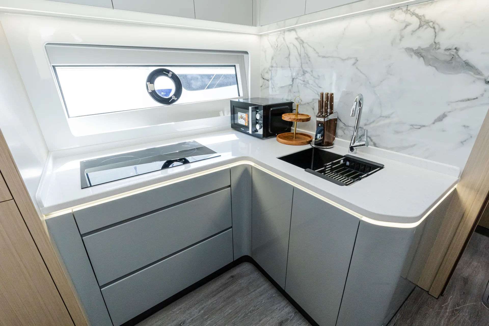 Bianco 56 galley with marble backsplash