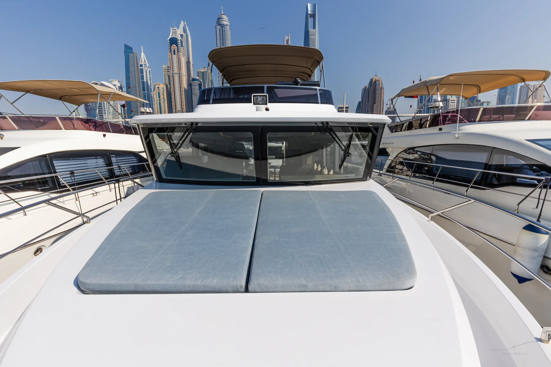 Bianco 56 bow sunpad with Dubai Marina skyline