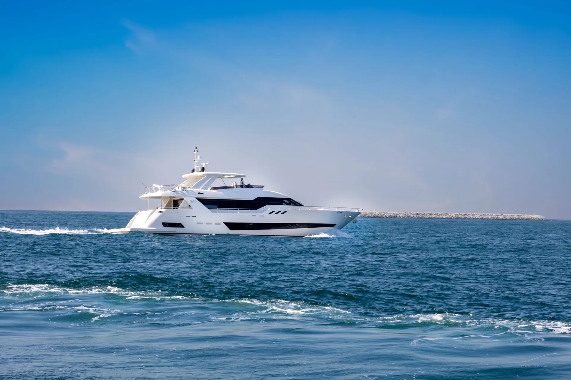 Fuego 96 cruising on open Dubai waters