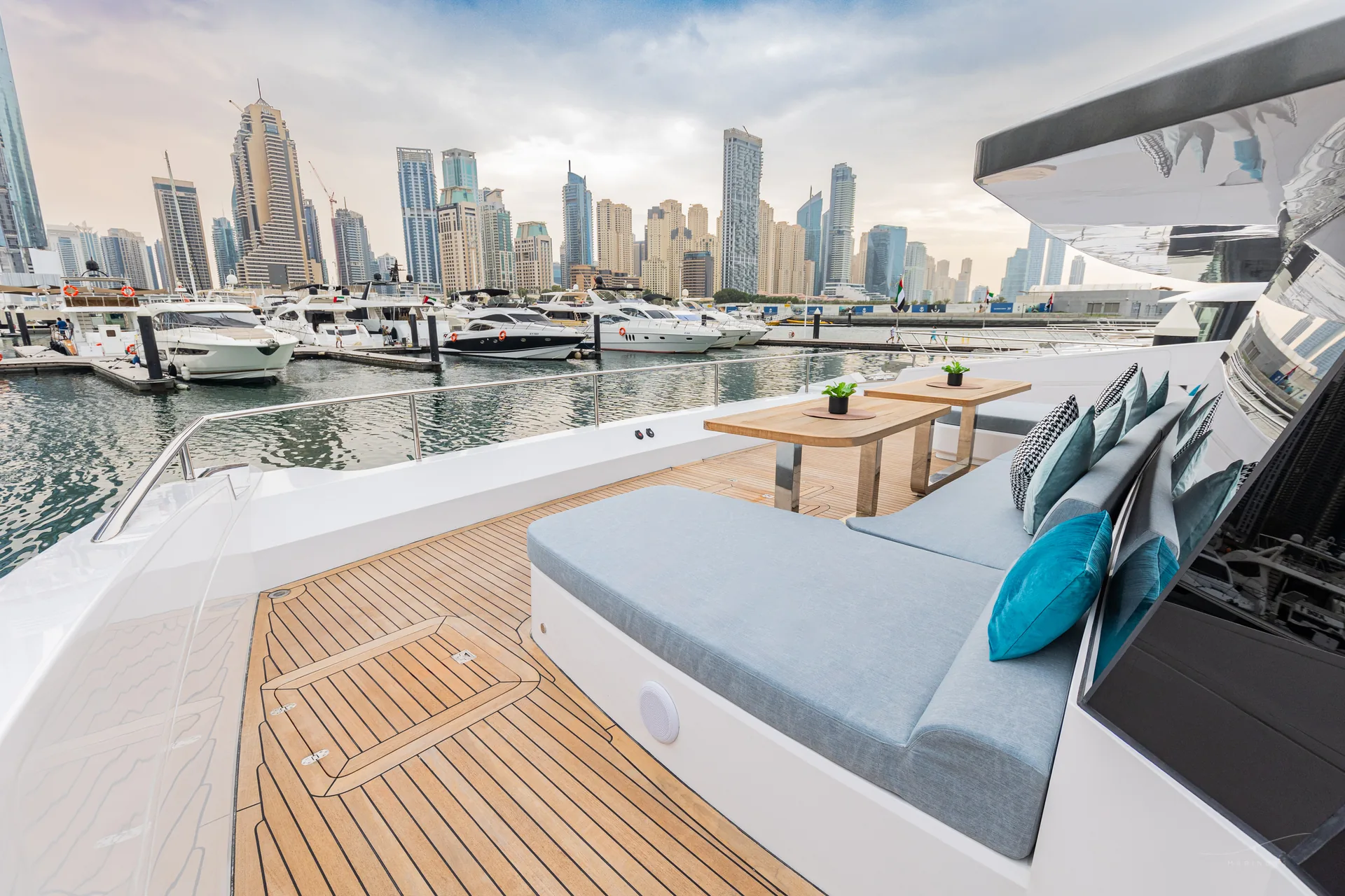 Isla 60 bow sunpad with Dubai Marina skyline