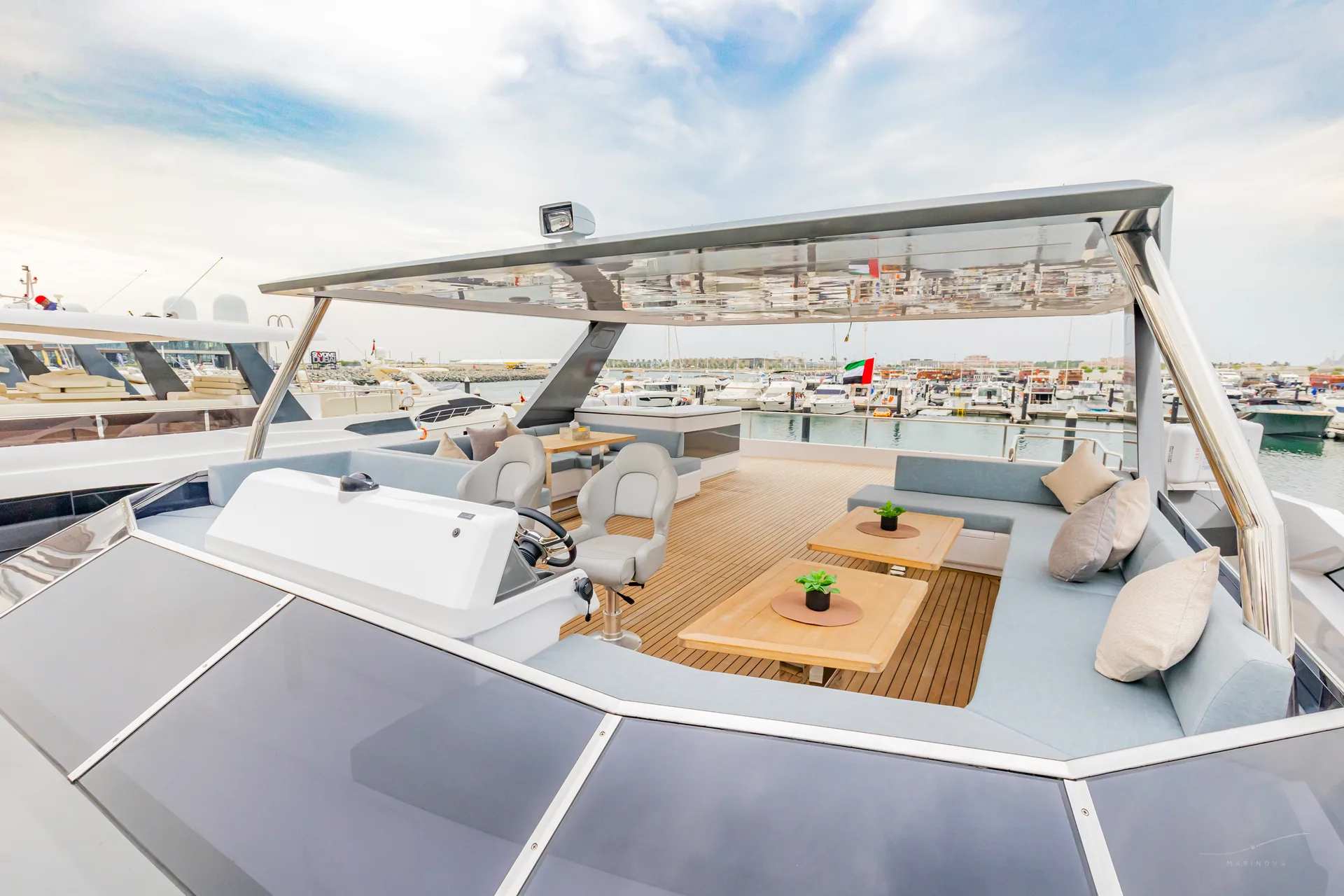 Isla 60 glass flybridge with twin helm chairs