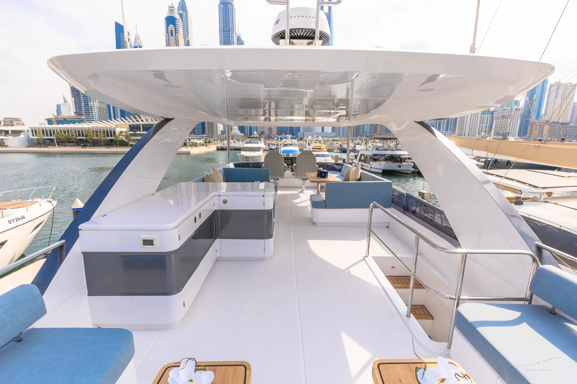 Vela 63 flybridge with canopy and Dubai skyline