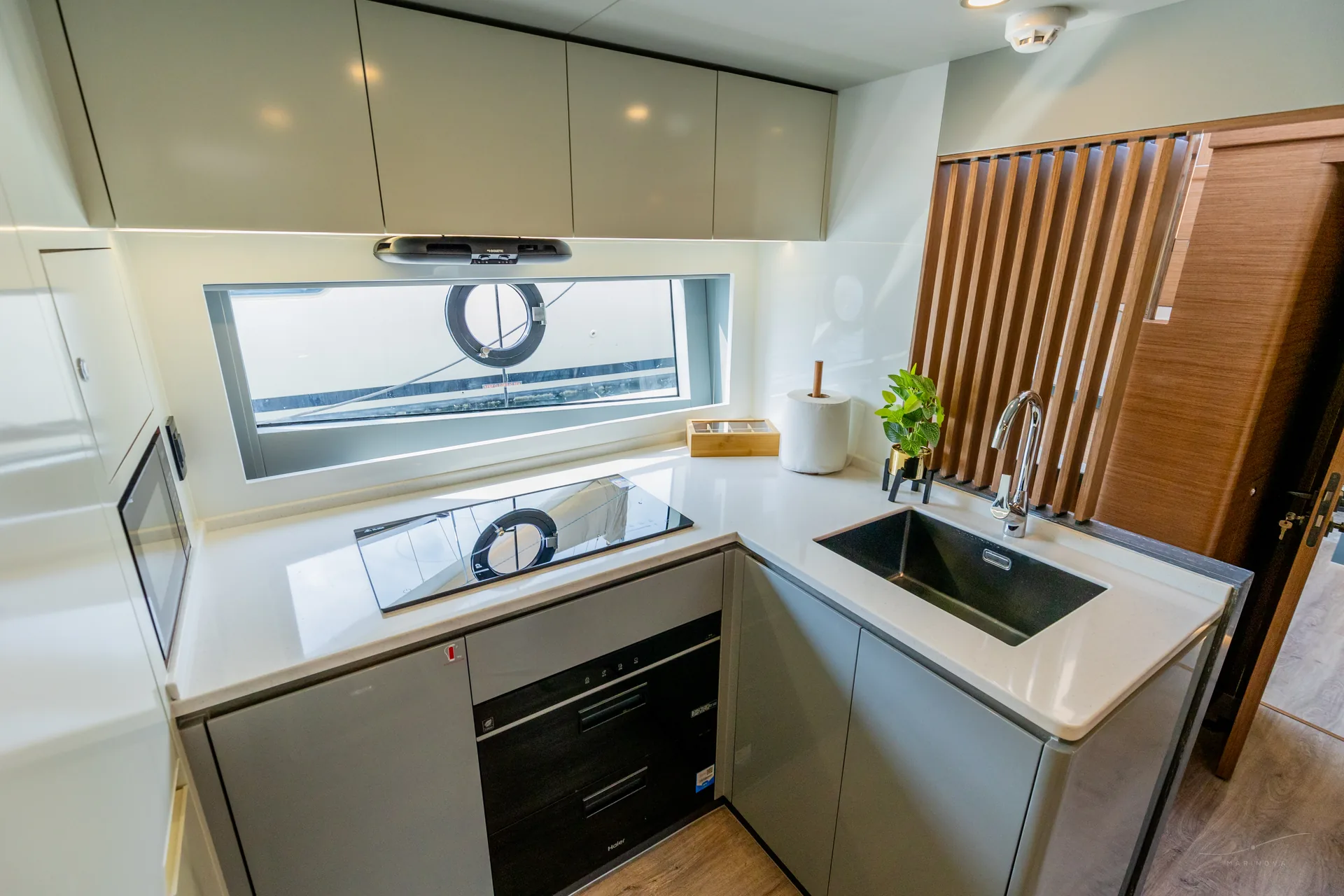 Vela 63 galley with marble and induction stove