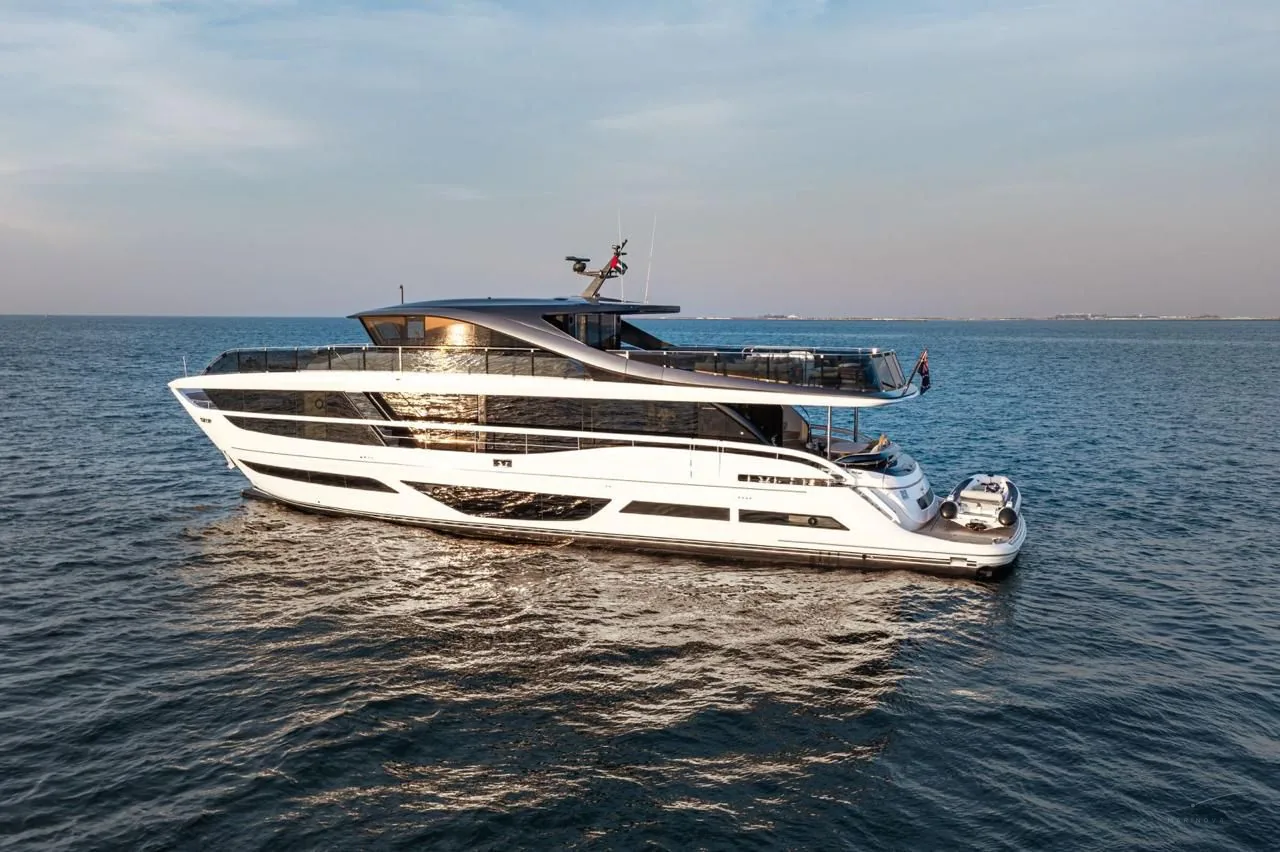 Princess X95 superyacht anchored on calm water