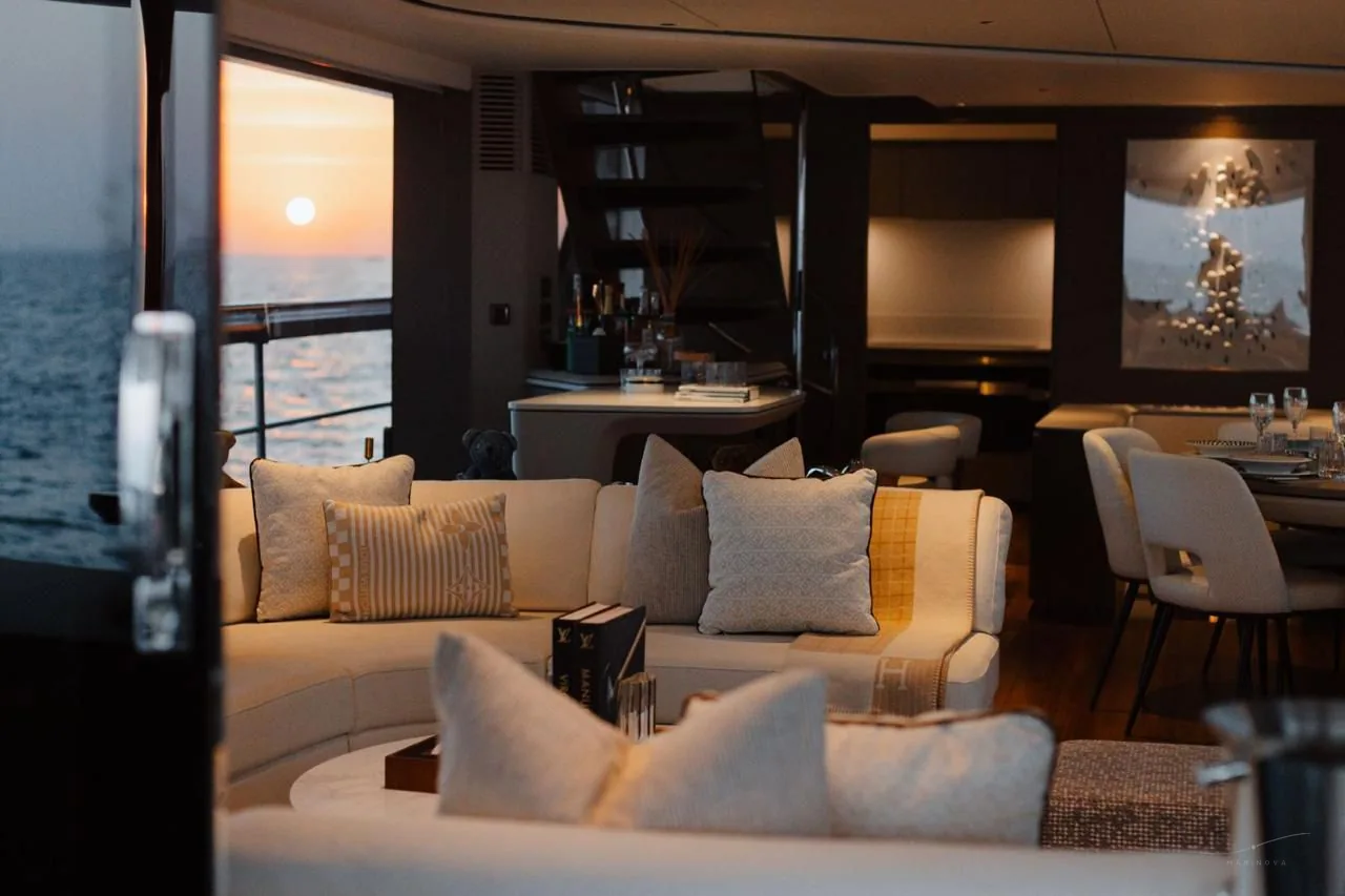 Princess X95 main saloon at sunset