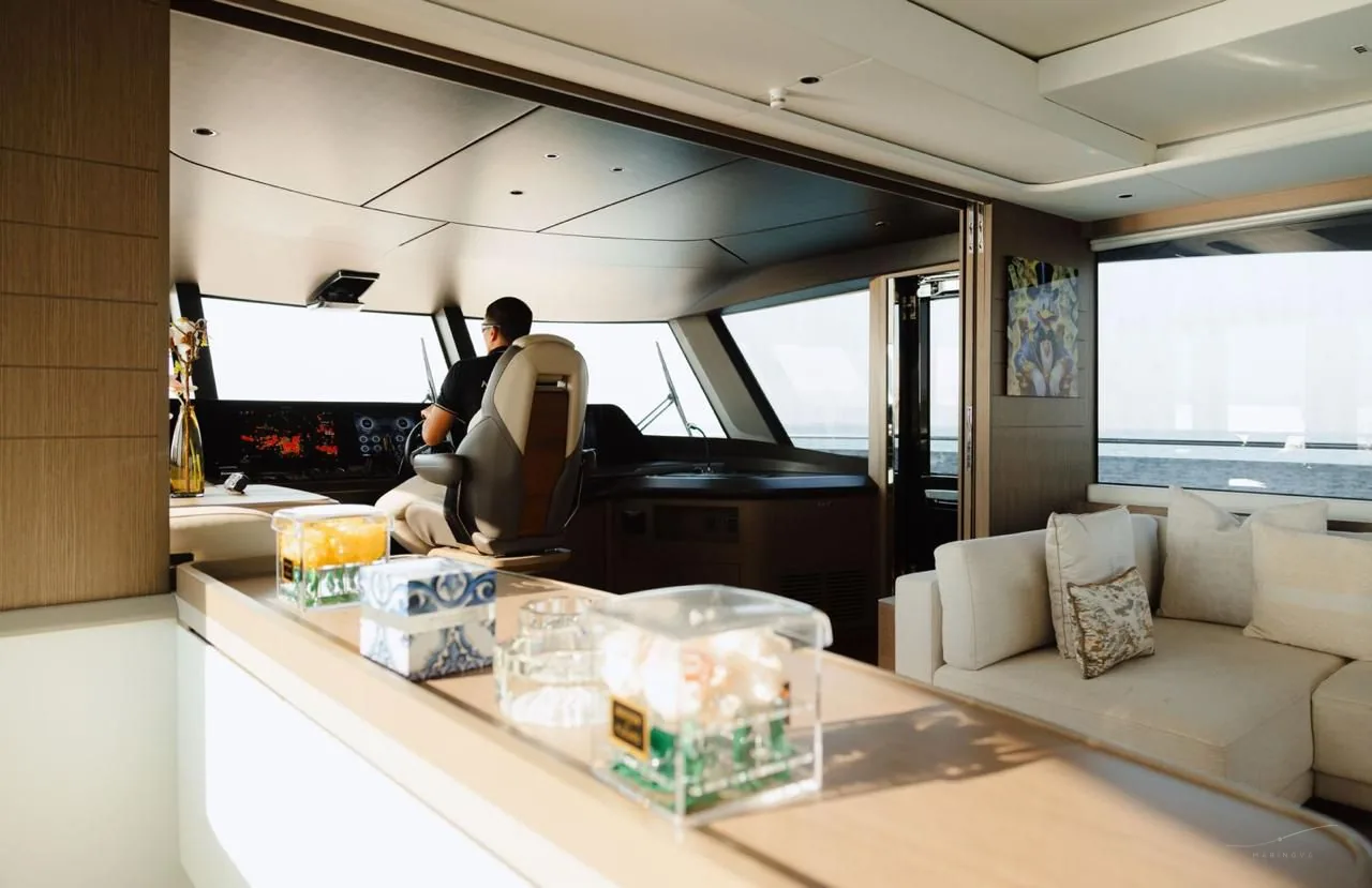 Princess X95 helm station with professional crew