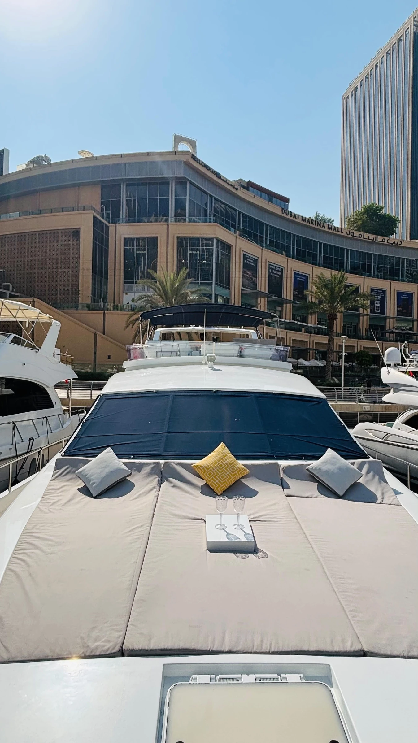80 feet yacht rental Dubai bow sunbed with open deck space.