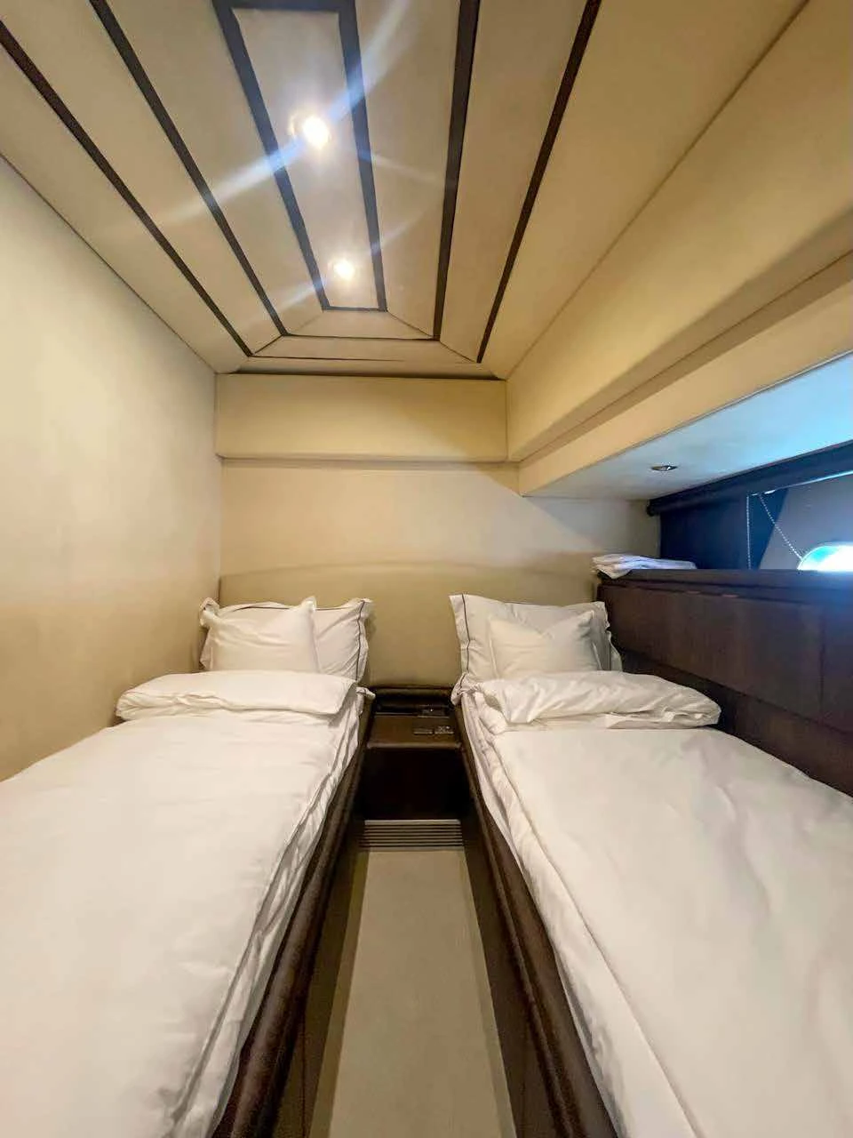 80 feet yacht rental Dubai twin guest cabin with two single beds.