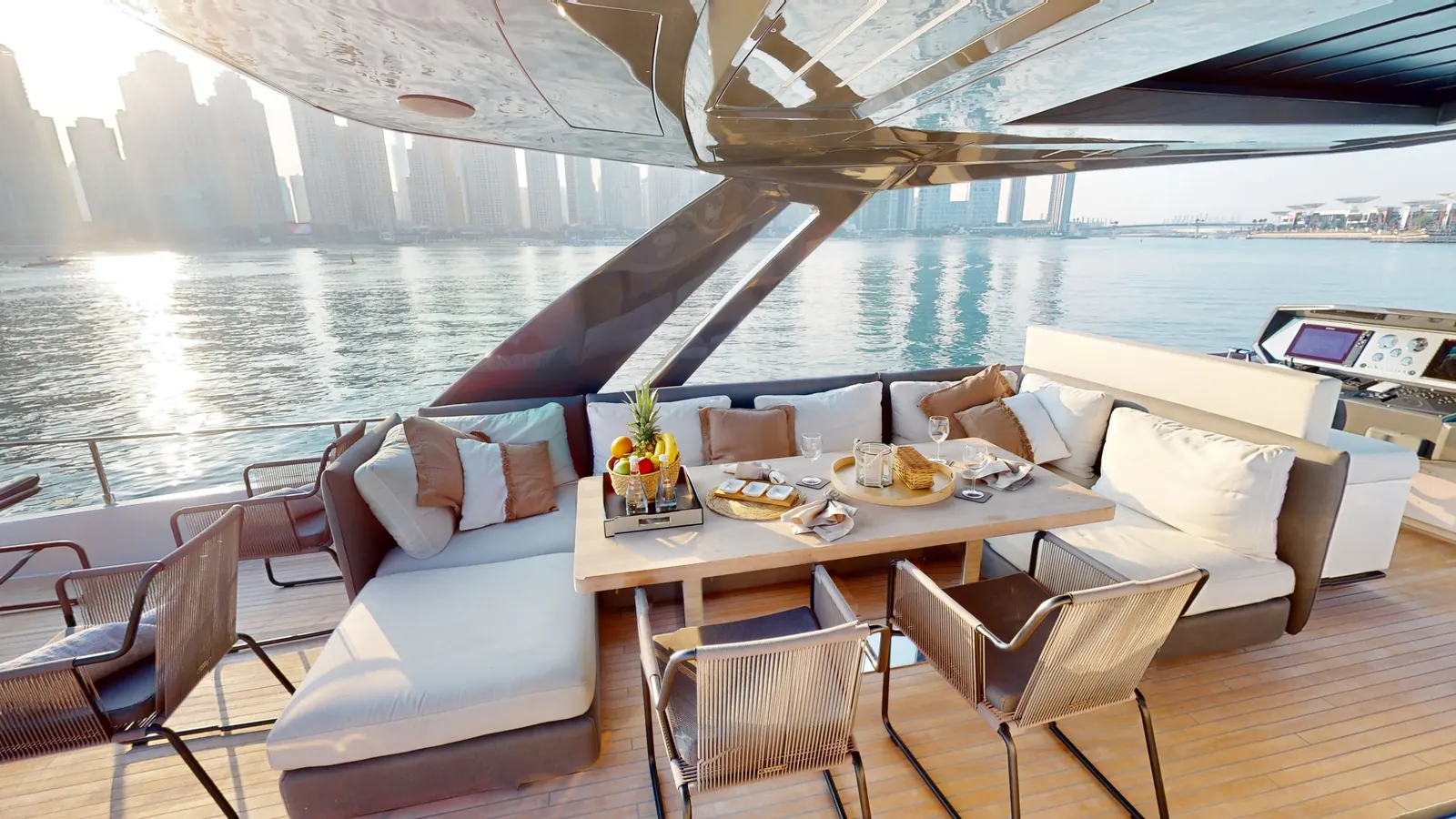 Bella 78 aft deck in golden hour
