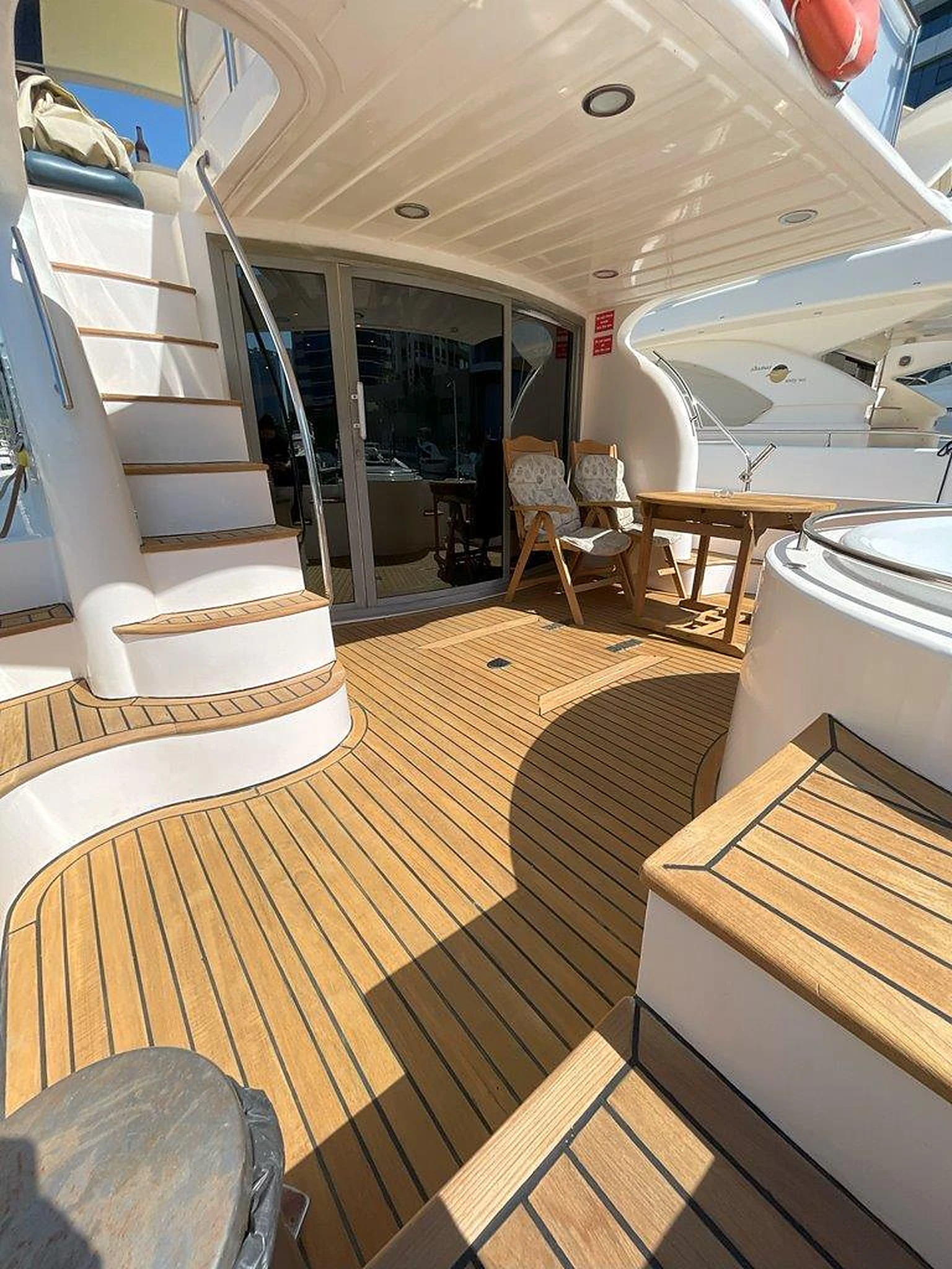 68 feet yacht rental Dubai shaded aft deck seating area aboard Eternity