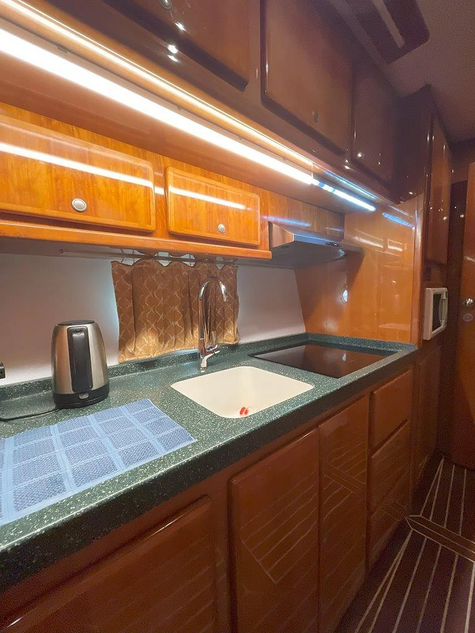 68 feet yacht rental Dubai galley counter and storage aboard Eternity