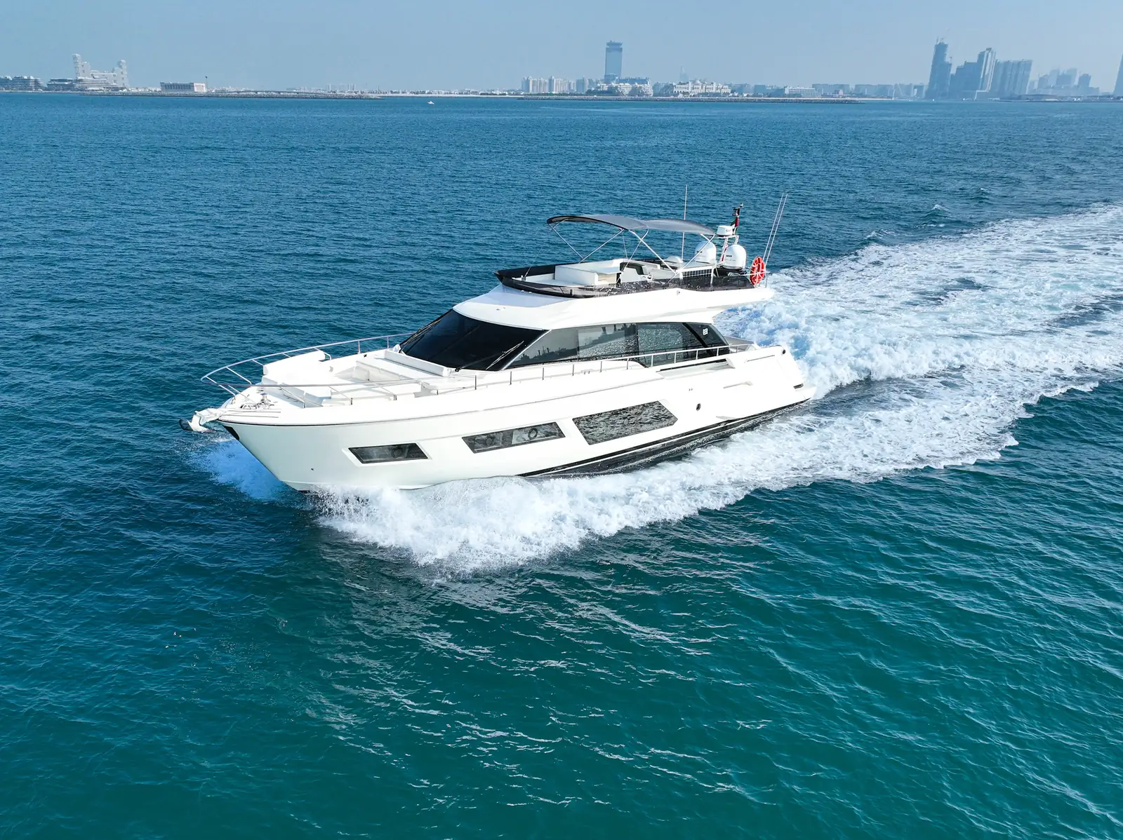 Ferretti 67 cruising the Dubai skyline