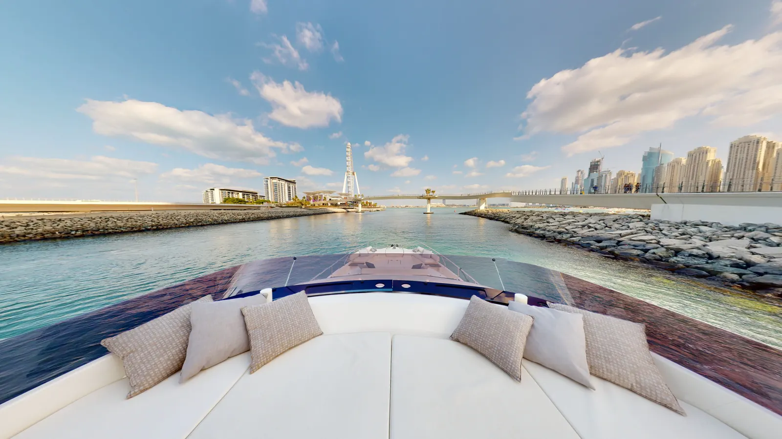 Ferretti 67 bow with Ain Dubai behind