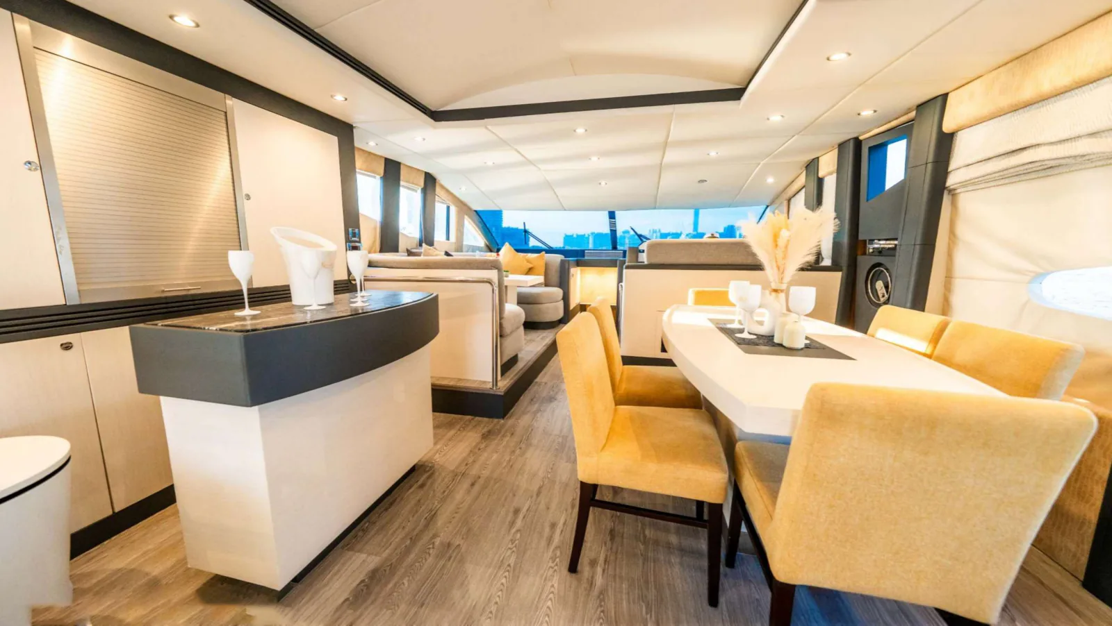 Majesty 77 yacht saloon bar counter next to the dining table.