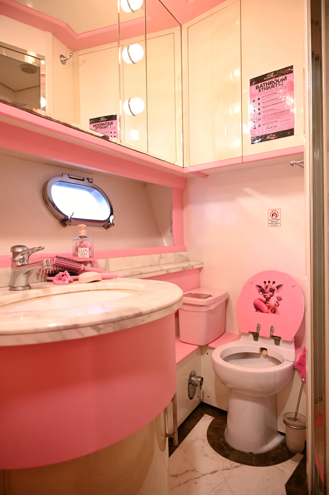 Pink yacht rental Dubai bathroom vanity with pink details
