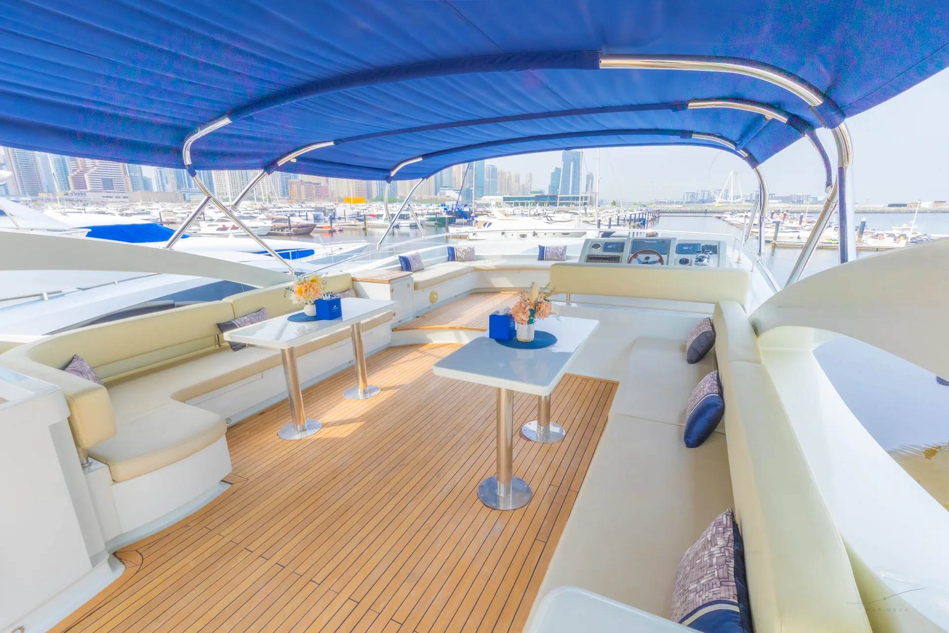 Rosso 110 flybridge wide view with helm and seating