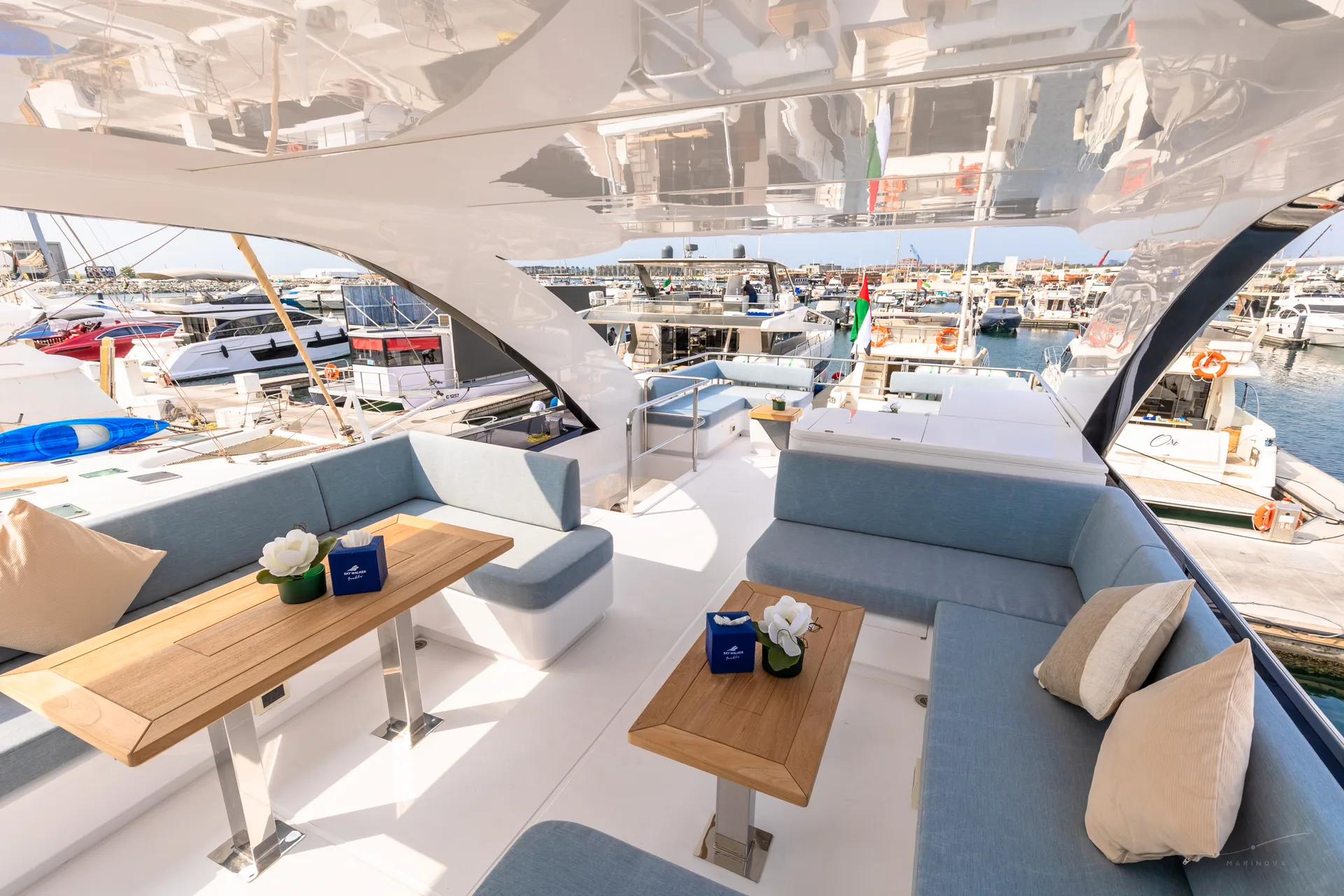 Vela 63 flybridge U-lounge and dining tables