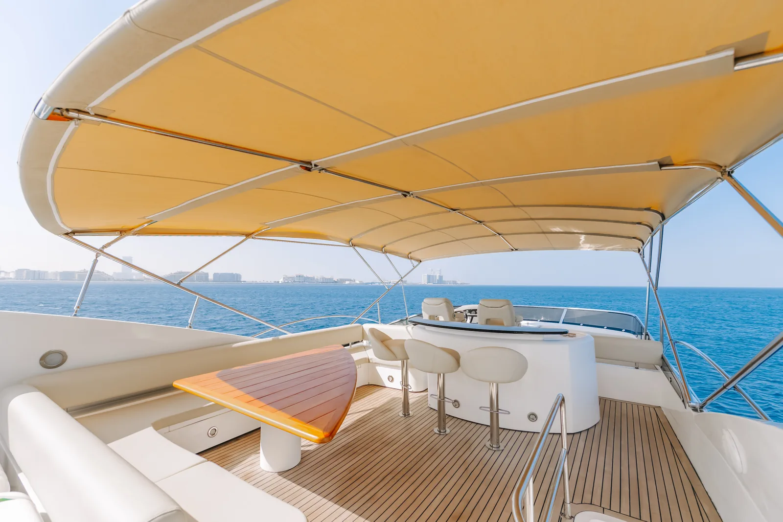 Why Not 82 flybridge seating with Dubai skyline